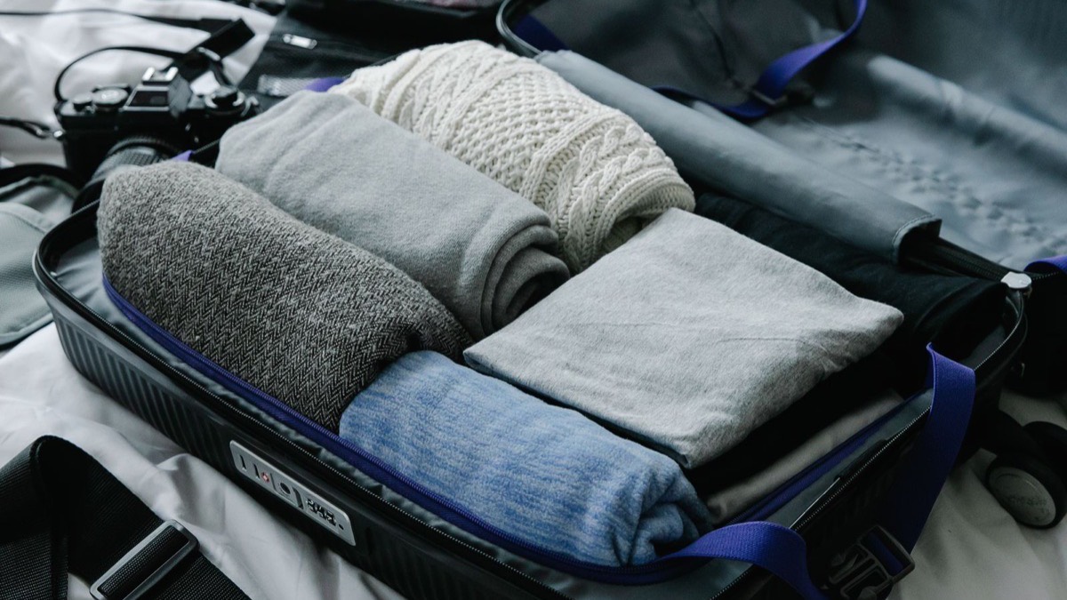 Packing a suitcase before a flight home